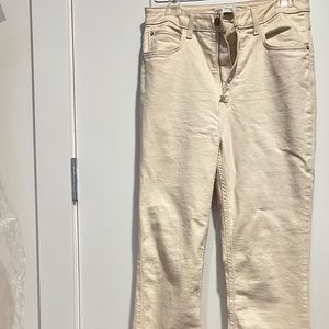 SLIM FLARED SLITTED HIGH RISE JEANS